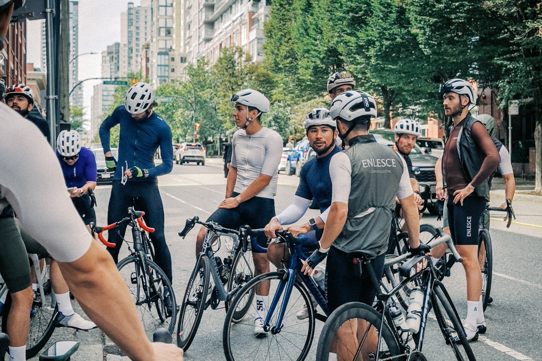 ENLESCE x Rivian group ride leaving Downtown Vancouver with 65 riders